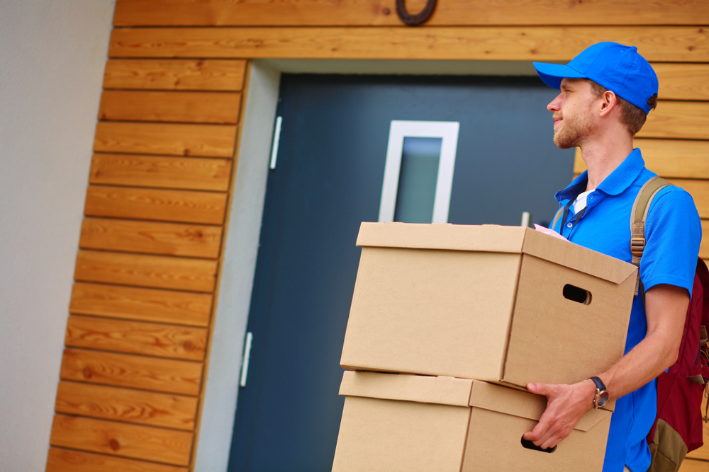 House removals team in Derby preparing items for transport